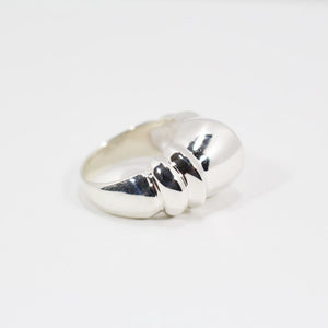 Side view of sculptural sterling silver ring.